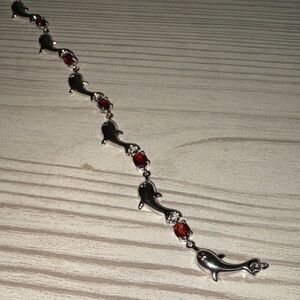 Silver Dolphin Bracelet with Red Accents